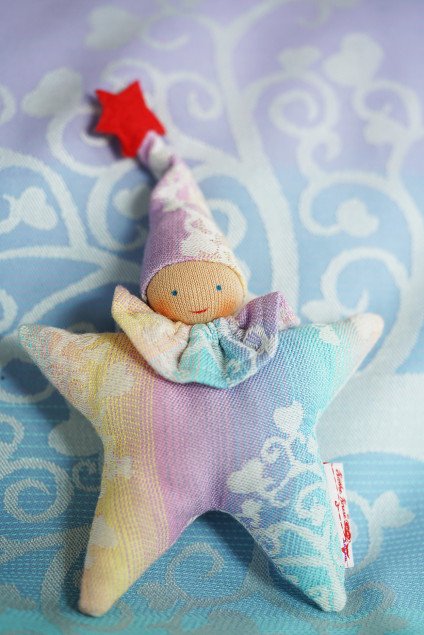 Clutching toy star Marie in Wonderland