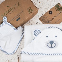 Soft, absorbent bamboo fiber hooded towel set featuring a cute bear design, perfect for kids' bath time.