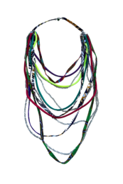 Colorful, multi-strand necklace with a variety of materials and textures, including beads, cords, and chains in vibrant hues of green, purple, and other colors.