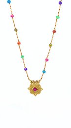  Colorful vermeil necklace with a floral pendant, featuring a mix of round beads in various vibrant hues.