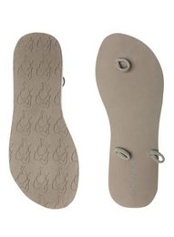 Taupe low slippers with textured soles and ankle straps. Suitable for casual wear.