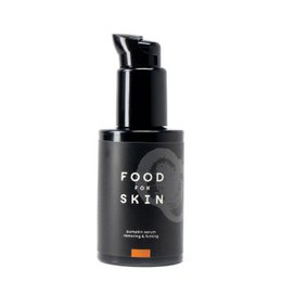 Black pump bottle pumpkin serum, orange accent label, strengthening face serum skincare product