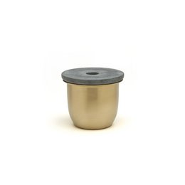 Small brass container with soapstone lid, suitable for storage.