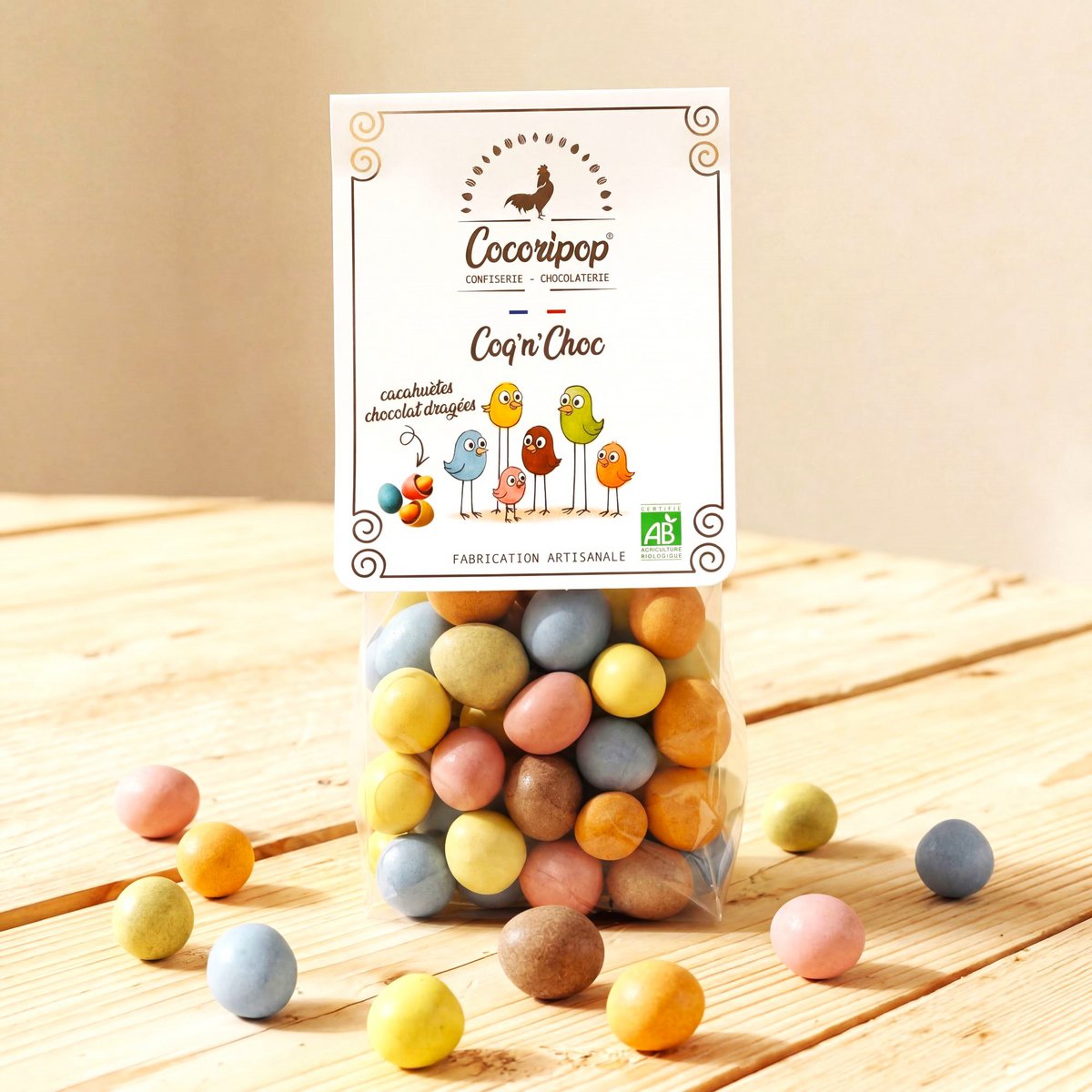 Coq 'n' shock (peanut chocolate dragee)