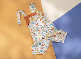 Cropped dungarees marine life print, short sleeves, colorful ocean animals pattern, baby romper playsuit.