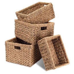 Woven seagrass storage baskets in various sizes, ideal for shelving and organization. Available in sets of 4 or 2.
