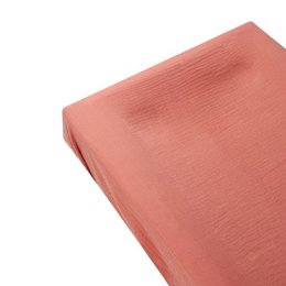 Soft, coral-colored cot mattress cover made of high-quality cotton fabric.