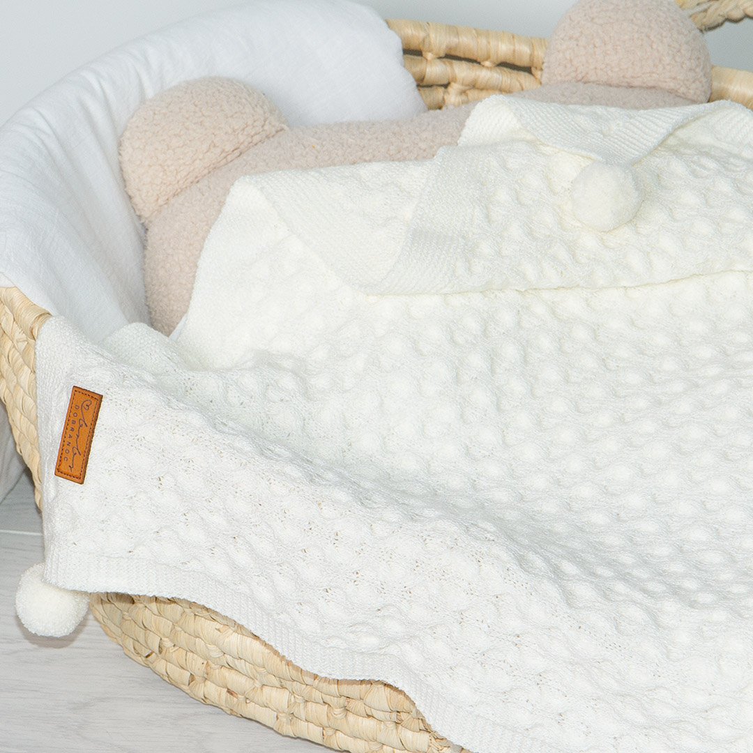 Morbida coperta con pompon "LILY' 70x90