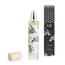 Floral cherry blossom fragrance in a 100ml/3.38 fl.oz spray bottle with a decorative pattern design.