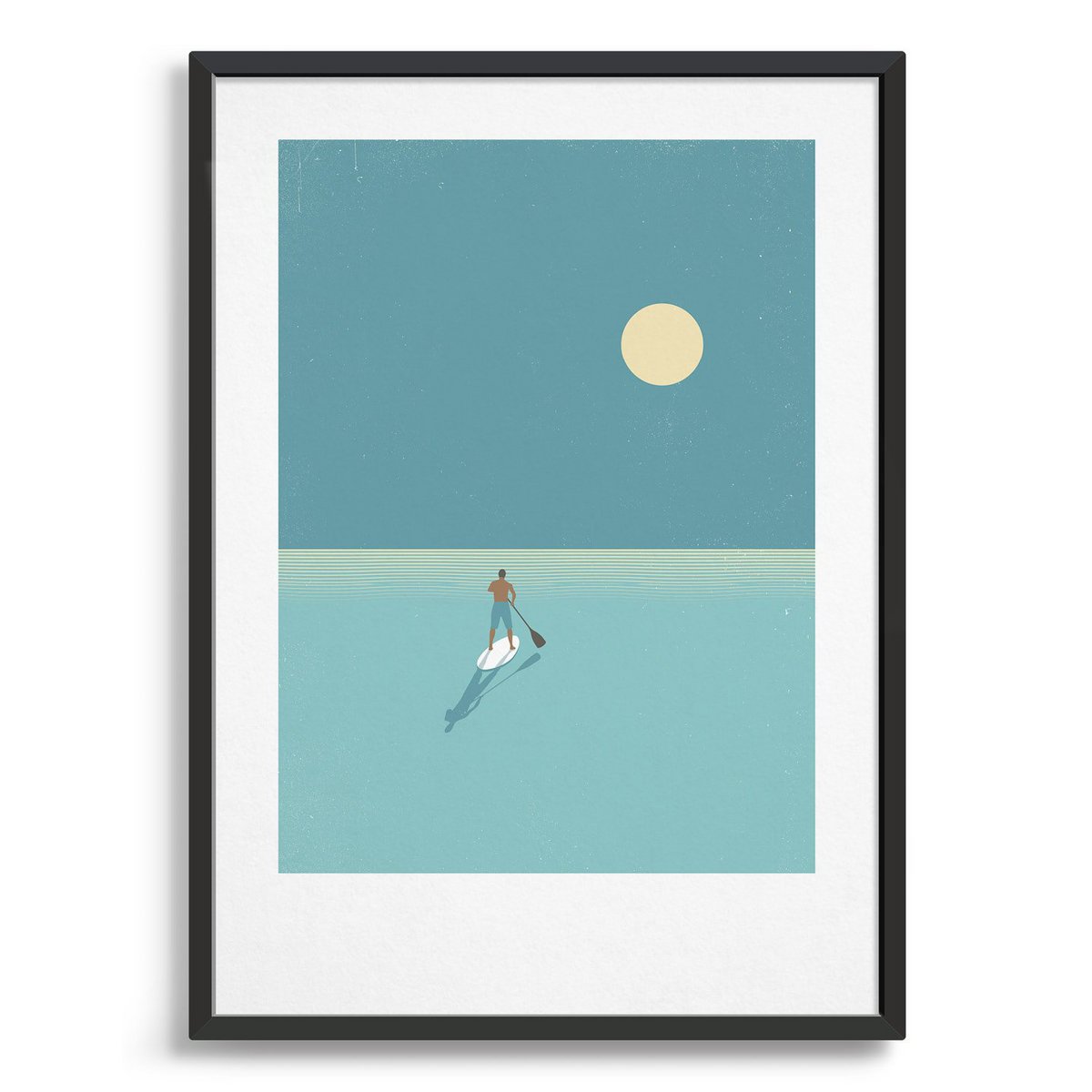 Paddleboarder at sunset
