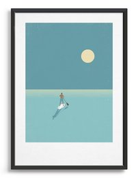 Paddleboarder ved solnedgang