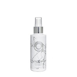 A salt spray for hair with a lion's mane design on the bottle. The spray is designed to add volume and texture to the hair.
