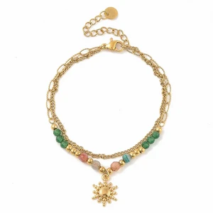 LOUIZ Jade-Armband mit Gold- und Sonnenanhänger