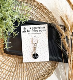 Shopping cart coin - It's only a crisis when the beer runs out
