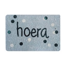Colorful confetti-patterned greeting card with the text "hoera" (Dutch for "hurray") in a playful font.