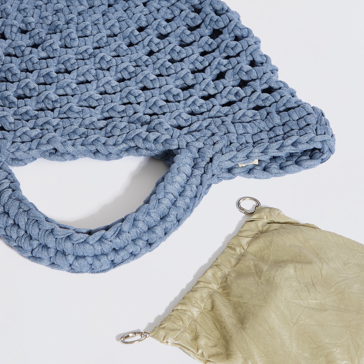 “Ingrid” gehaakte mandtas met waterdicht etui denimblauw