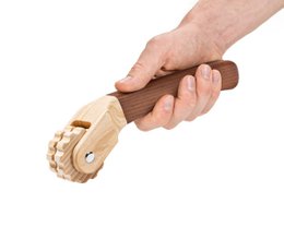 Wooden massage roller with ergonomic handle for deep tissue massage and muscle relief.