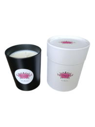 A tall, round black candle with a pink label featuring a crown design. The candle is labeled "Candle Paris Mon Amour Parc Monceau (Bois noir) 140 g" and is categorized as a scented candle.