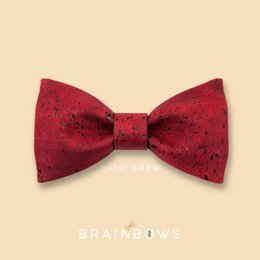 Red, textured bow tie with a shiny finish.