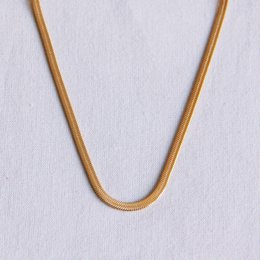 Gold-colored flat snake chain necklace, 3mm thick, suitable for casual or formal wear.