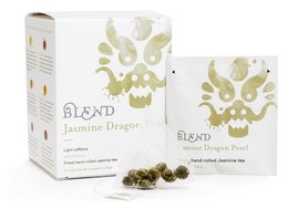 Jasmine Dragon Pearl tea in a 15 pyramid box. The tea leaves are tightly rolled into small pearls with a light green color and delicate jasmine aroma.