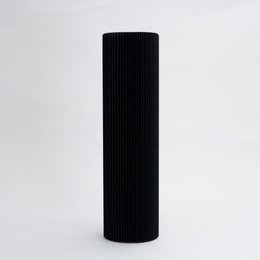 Tall, cylindrical black side table with a ribbed texture and two size options.