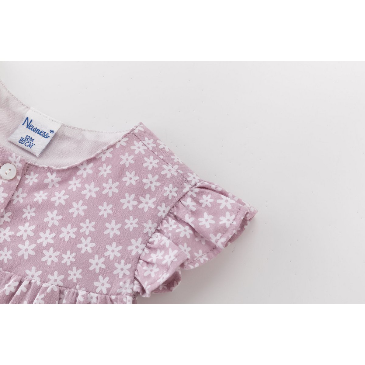 Ranita bebé con mangas volante y estampado malva BGV96542