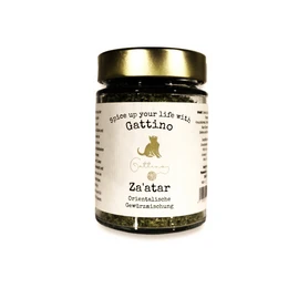 Harissa spice mixture, a blend of chili peppers, garlic, cumin, and other spices, with a vibrant orange-red color and a complex, aromatic flavor profile.