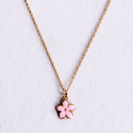 Delicate necklace with a pink flower