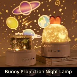 Bunny-shaped galaxy projection night lamp with rotating planets, stars, multiple lighting modes, pink and blue variants for kids' rooms.