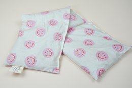 Katoenen warmtekussen gevuld met biologische spelt Smiley Pink