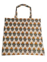 Blockprinted tote bag with repeating fox head pattern, beige canvas, large capacity shopping bag.