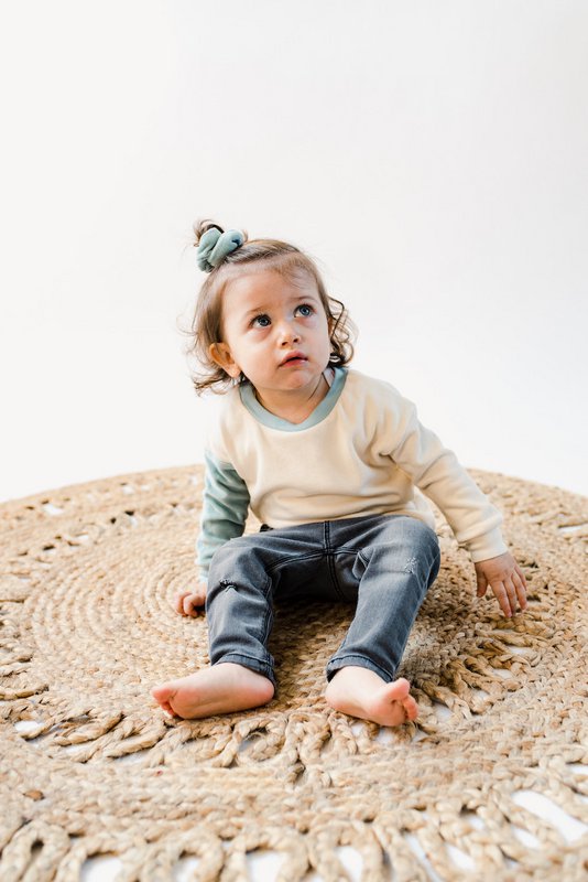 *Bestseller* Sustainable Color-block Baby Sweater | Ecru with Aqua arm | 100% GOTS certified organic cotton