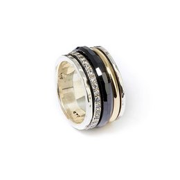 A wide, multi-band wedding ring with alternating gold, silver, and black bands, accented with small diamonds.