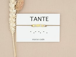 Elegant morse code bracelet in silver, rose gold, and gold tones. Features a minimalist design with a clasp closure. Suitable for everyday wear.