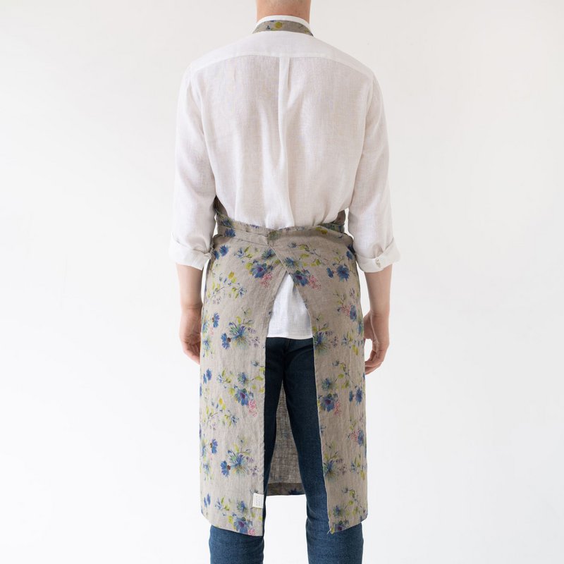 Fleurs sur le tablier de chef en lin naturel