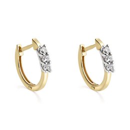 Elegant bicolor gold hoop earrings featuring a row of sparkling diamonds totaling 0.21 carats in a high-quality HSI2 clarity grade. These statement earrings are perfect for adding a touch of glamour to any outfit.