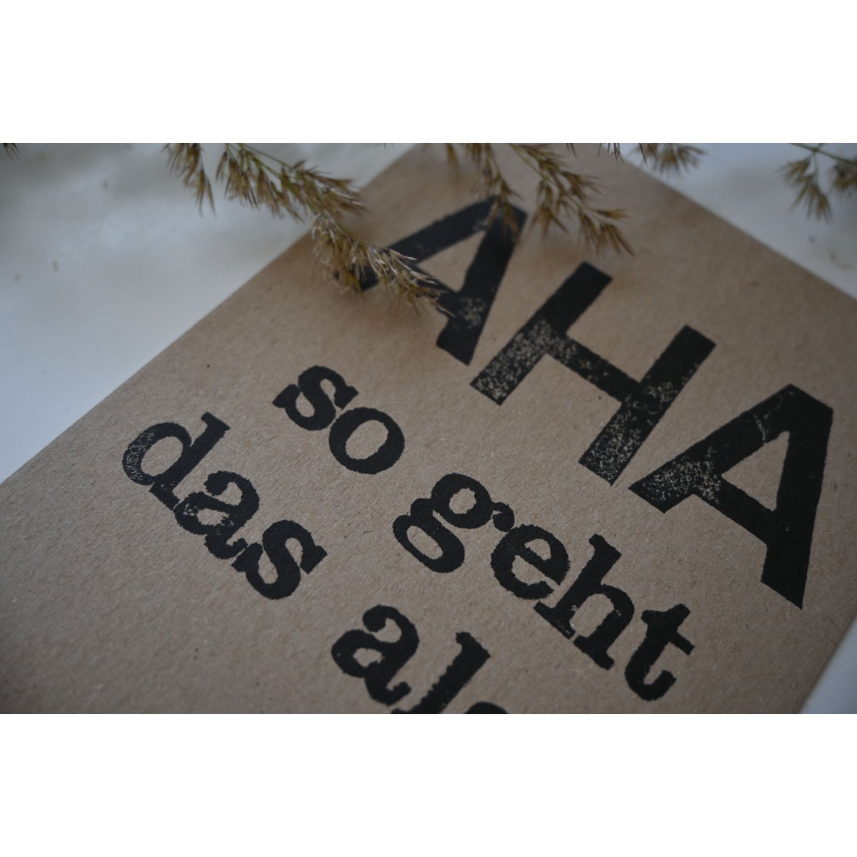 Gestempelde postkaart "AHA"
