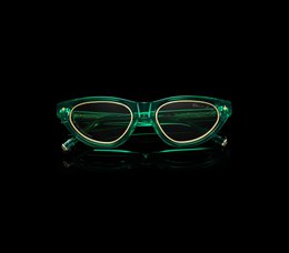 Poison green limited edition sunglasses with a bold, retro-inspired frame design.