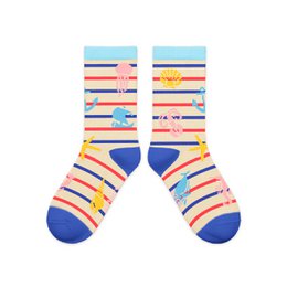  Colorful striped kids socks featuring sea-themed elements like waves and shells. Made of soft, breathable cotton blend material.
