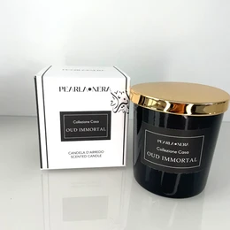 Luxury scented candle with oud fragrance, black glass container with gold lid, 200g size.