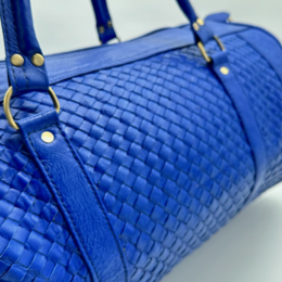 Klassisk vidunderblåt læderrejsetaske