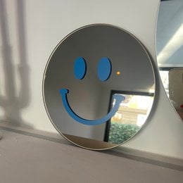 Det lille klare blå smil