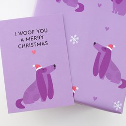 Świąteczny papier do pakowania z pieskiem „Christmas Dogs” w kolorze fioletowym