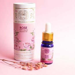 Rose essential oil, 100% natural, 10ml bottle, floral aroma, suitable for aromatherapy and skincare.