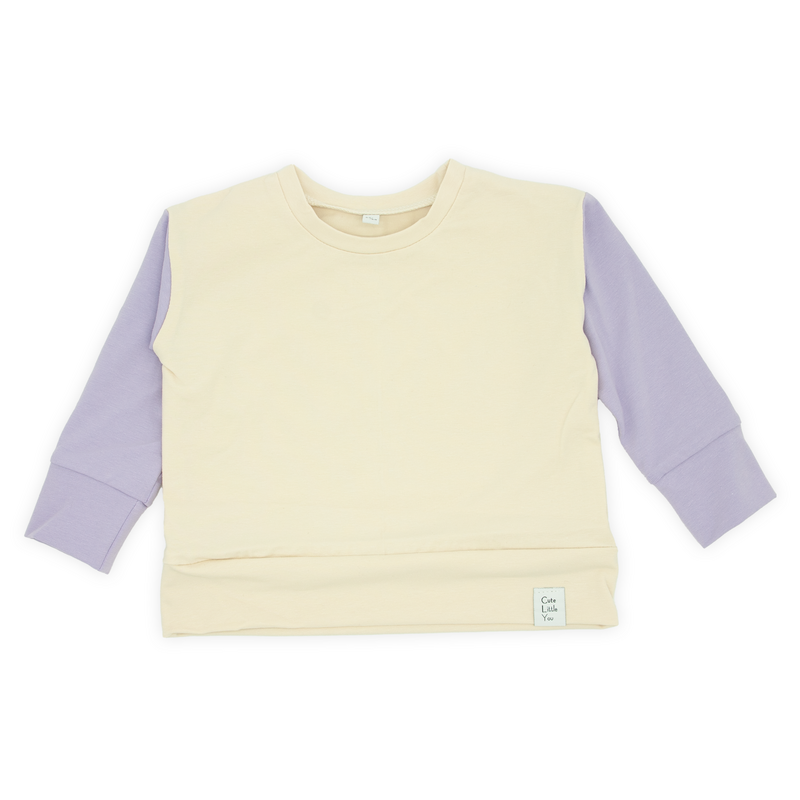 Elegante maglione oversize in colore écru con maniche lilla