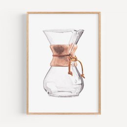 A glass Chemex coffee maker with a wooden collar, featuring a simple and elegant design.