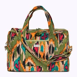 Large travel bag with colorful ikat pattern, suitable for weekend getaways.
