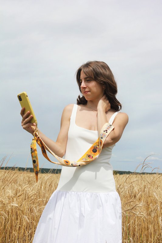 Omkeerbaar telefoonbandje "De Zonnebloem"
