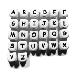  Square white beaded letters, 12mm in size, arranged in alphabetical order. The letters appear to be made of silicone material.